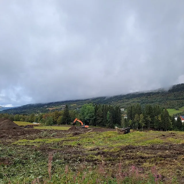 Gravemaskin i arbeid